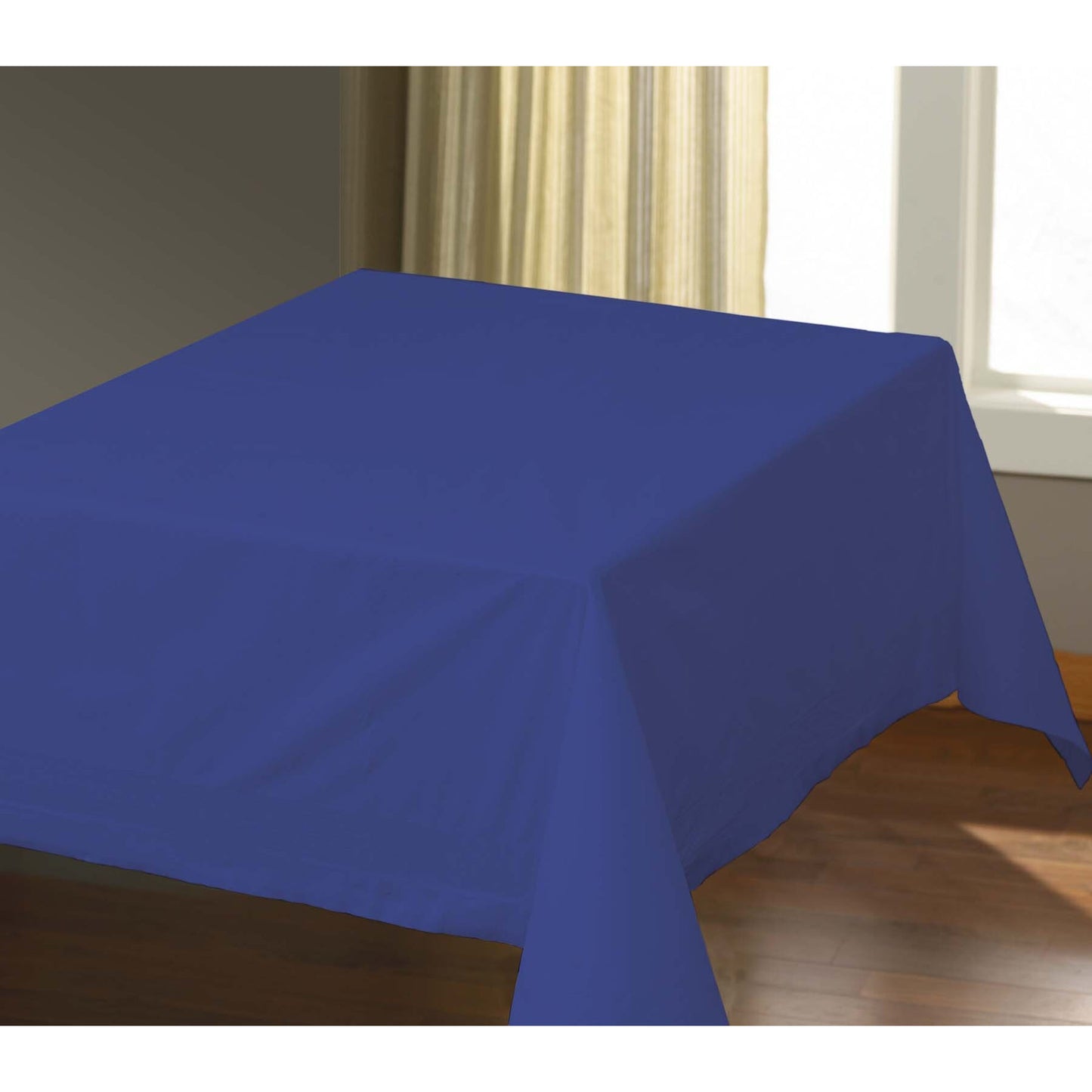 Blue tablecloth on a wooden table with a neutral background
