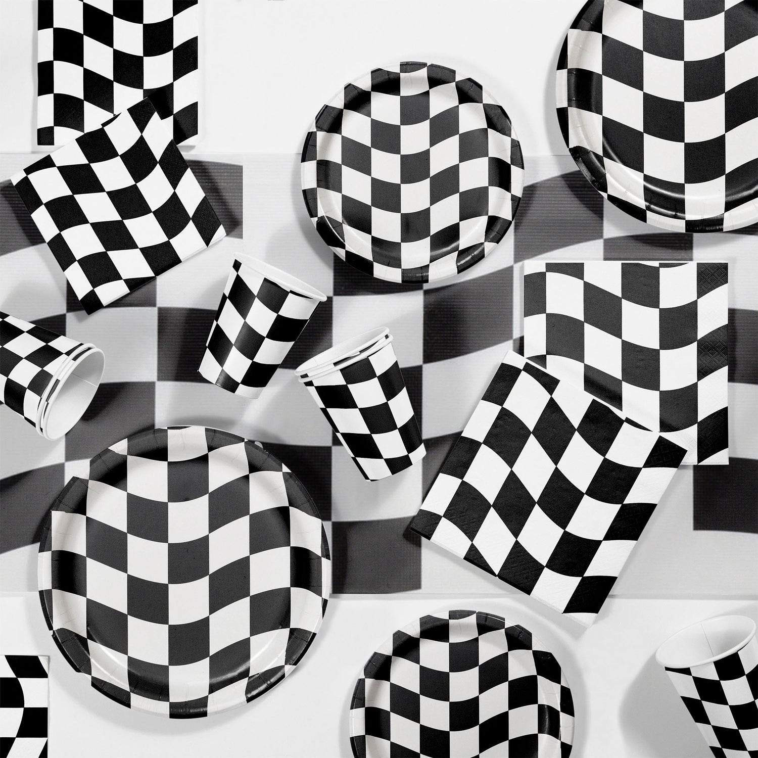 Black & White Check Party Supplies displayed on a table