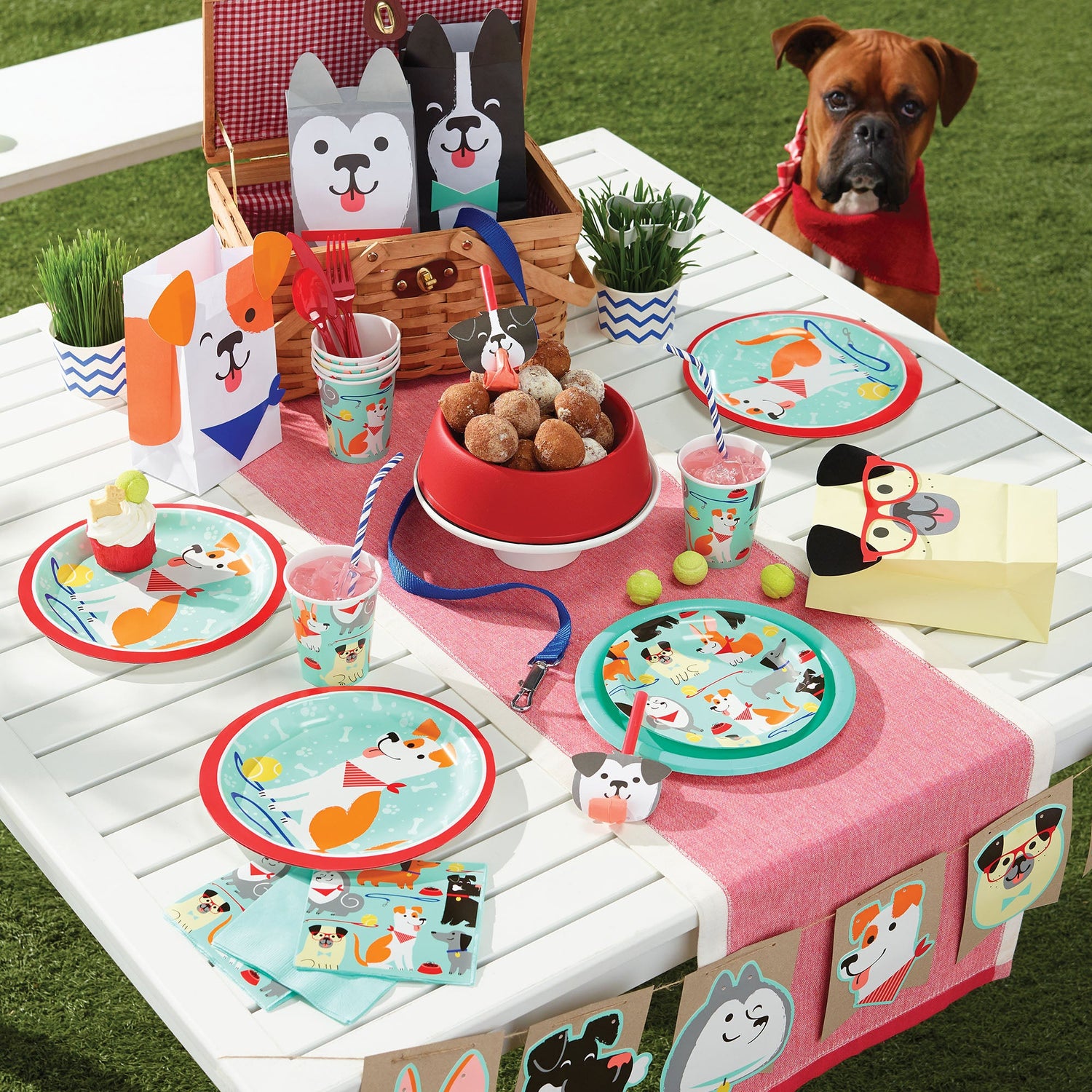 Dog Party party supplies on a table