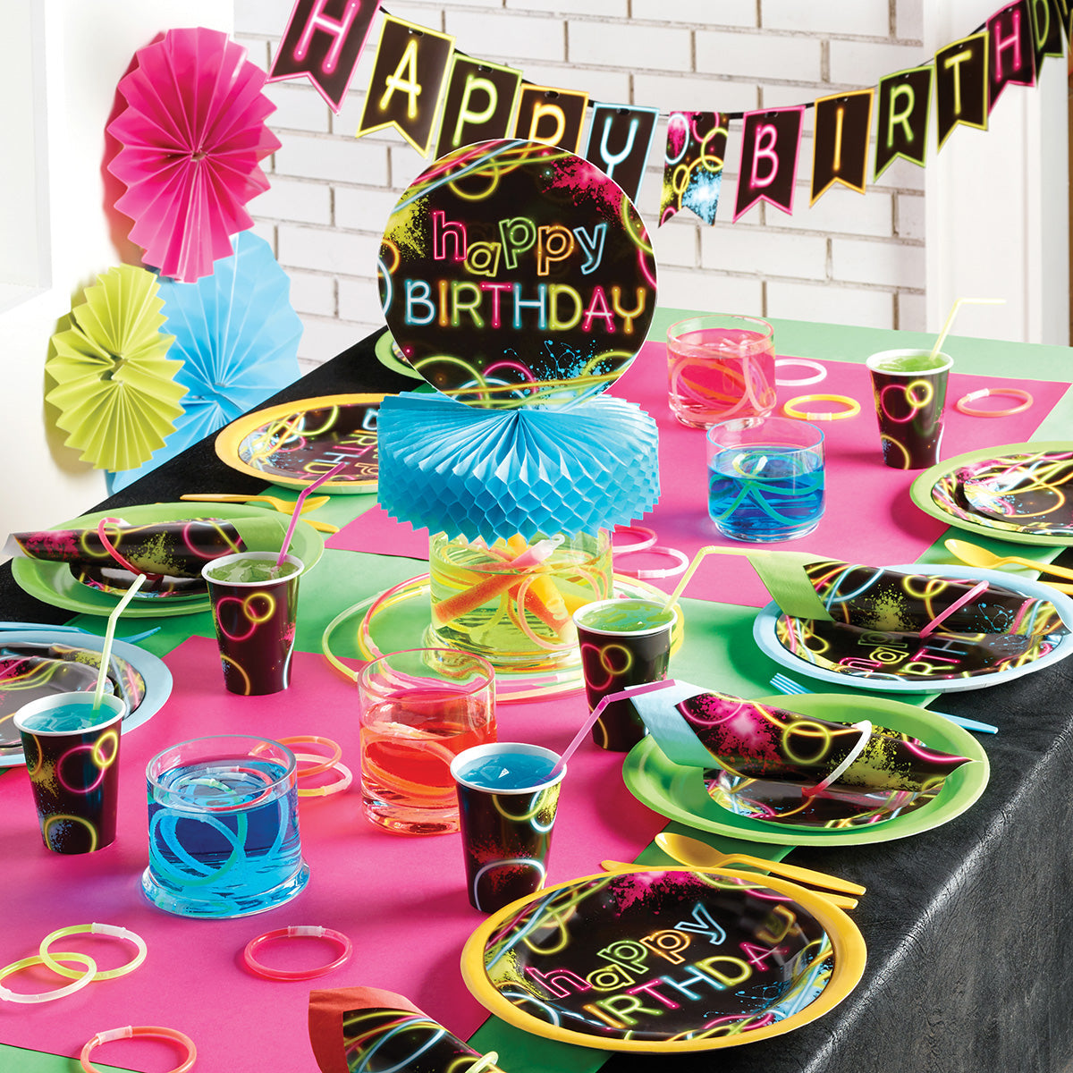 Glow Party Supplies displayed on a table