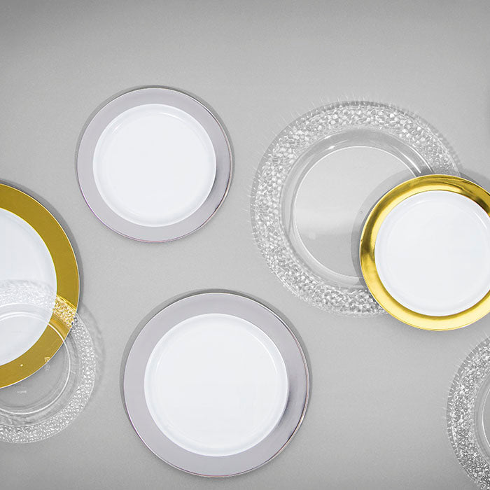 Gold, silver and clear plastic serving plates
