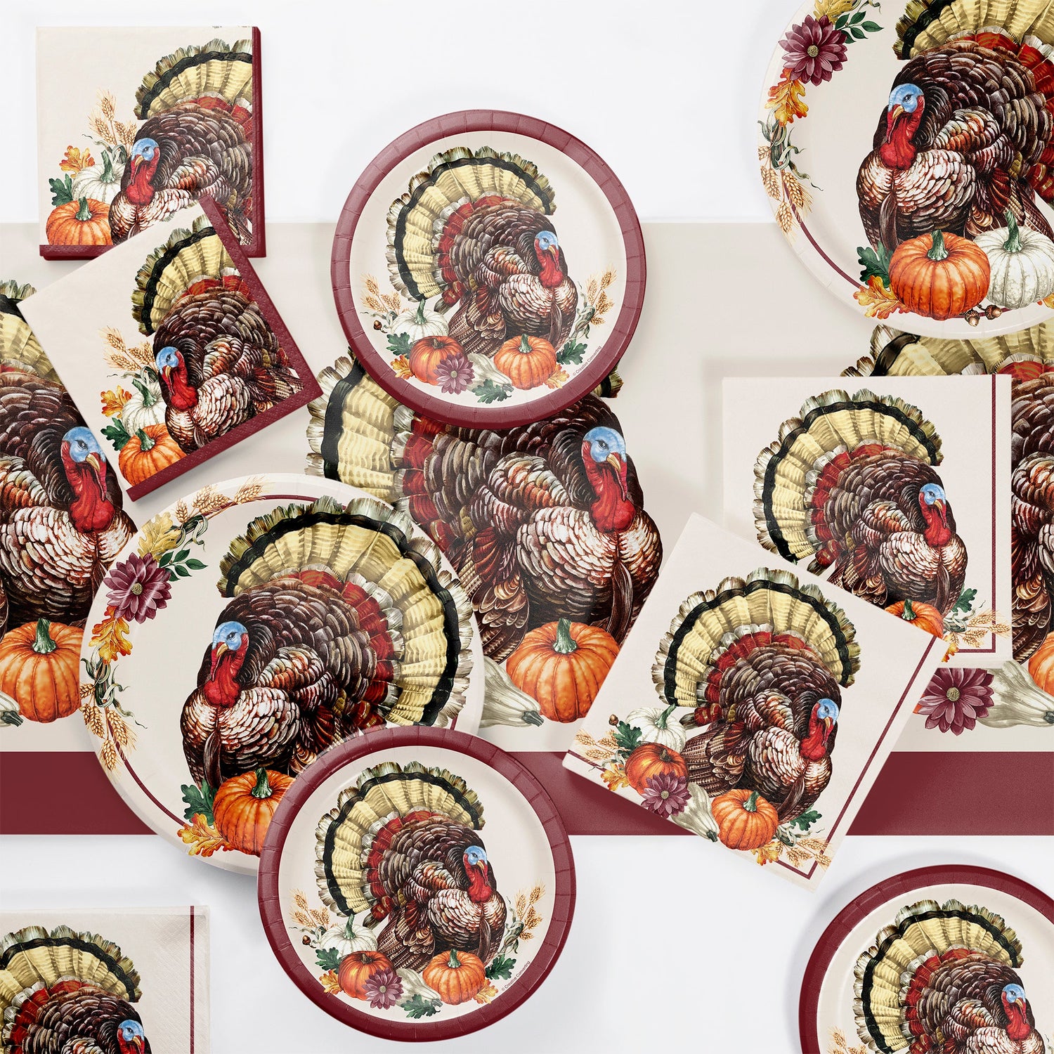 Vintage Turkey Party Supplies. Tableware featuring a turkey and pumpkins displayed on a table with a white background