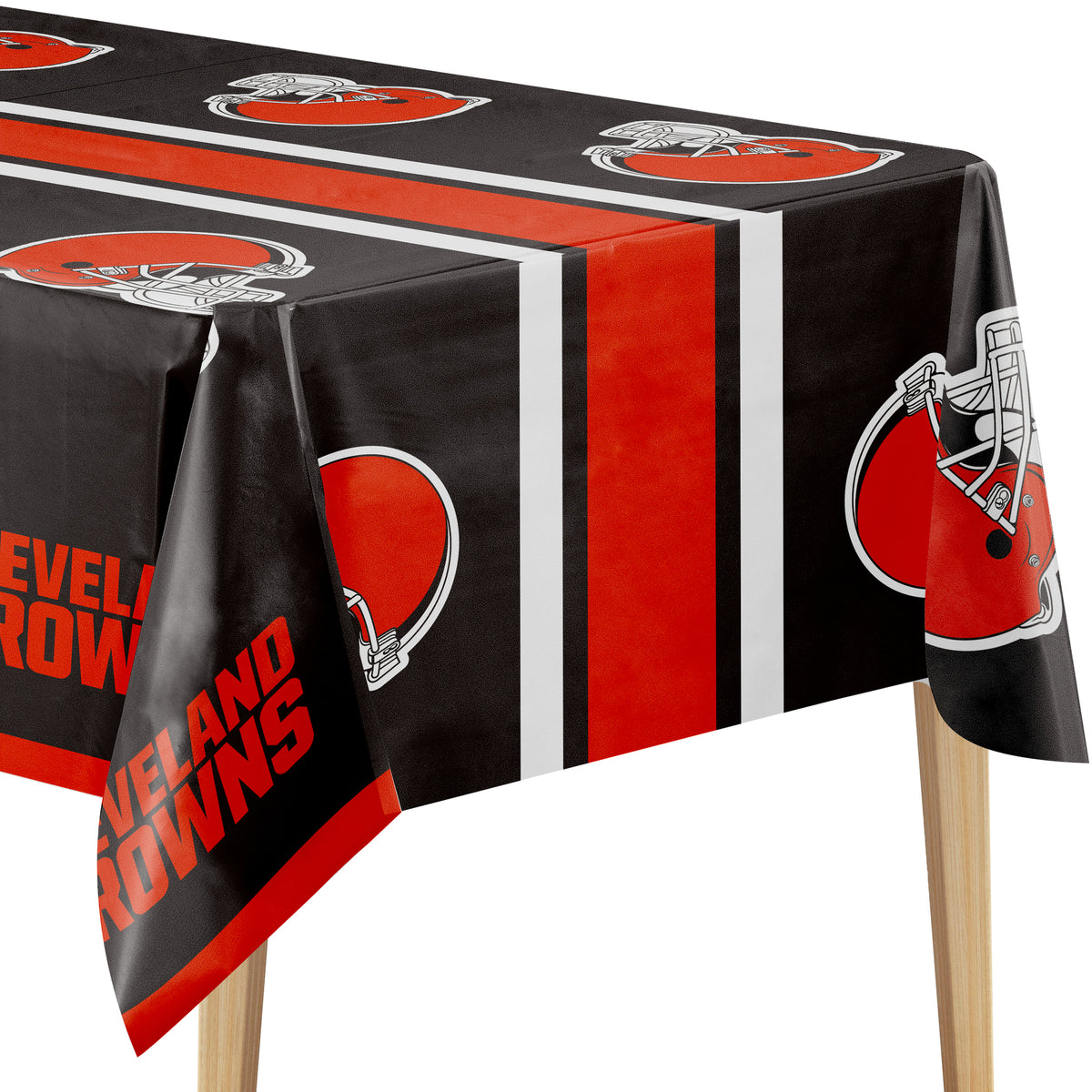 Close-up image of Cleveland Browns tablecloth with brown background, orange helmet logo, and "CLEVELAND BROWNS" text on a wooden table.