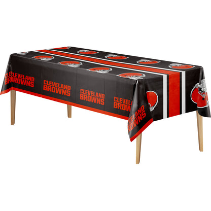 Cleveland Browns tablecloth with brown background, orange helmet logo, and "CLEVELAND BROWNS" text on a wooden table