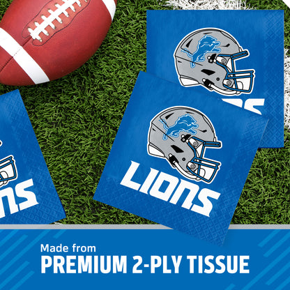 Three Detroit Lions themed square napkins on a green turf background next to a football, with a text banner at the bottom reading 'Made from PREMIUM 2-PLY TISSUE'.