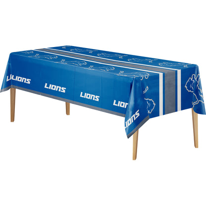 Detroit Lions tablecloth with blue background, lions logo, and "LIONS" text on a wooden table