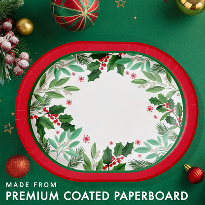 Christmas-themed paper plate with holly berries and red rim. Plate shown on a green background with festive decorations.