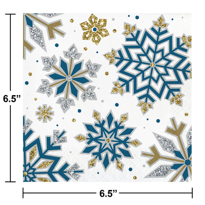 Paper napkin with blue, gold, and silver snowflakes and measurements on a white background