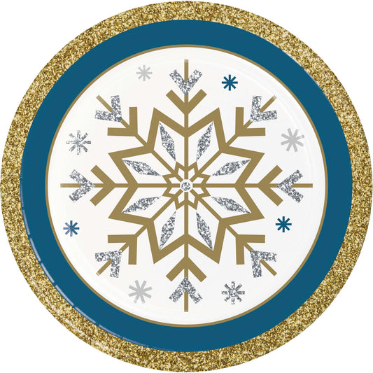 Decorative paper plate with gold snowflake design and glittery border on a white background
