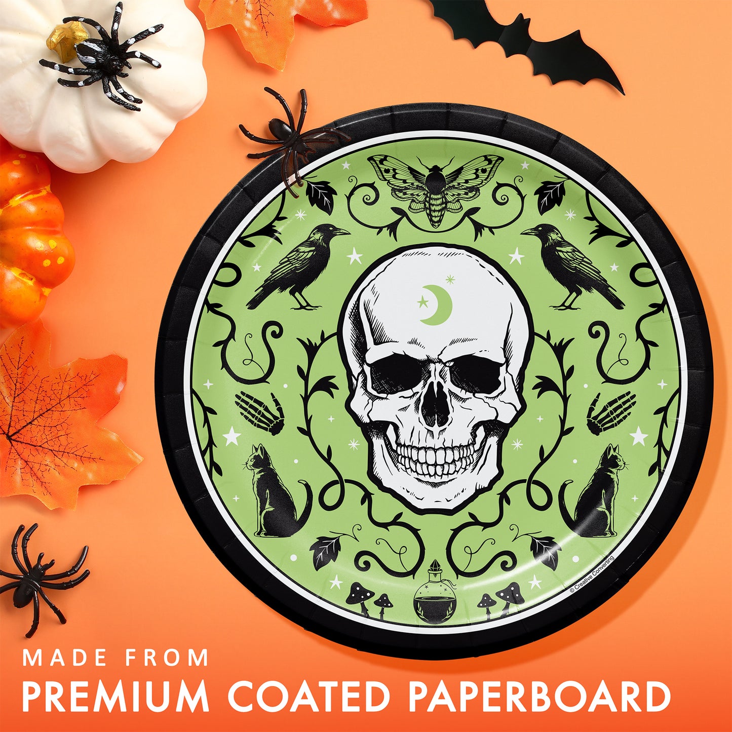 Spooky Season Dinner Paper Plates 96 ct. Halloween-themed paper plate with skull design on a colorful background