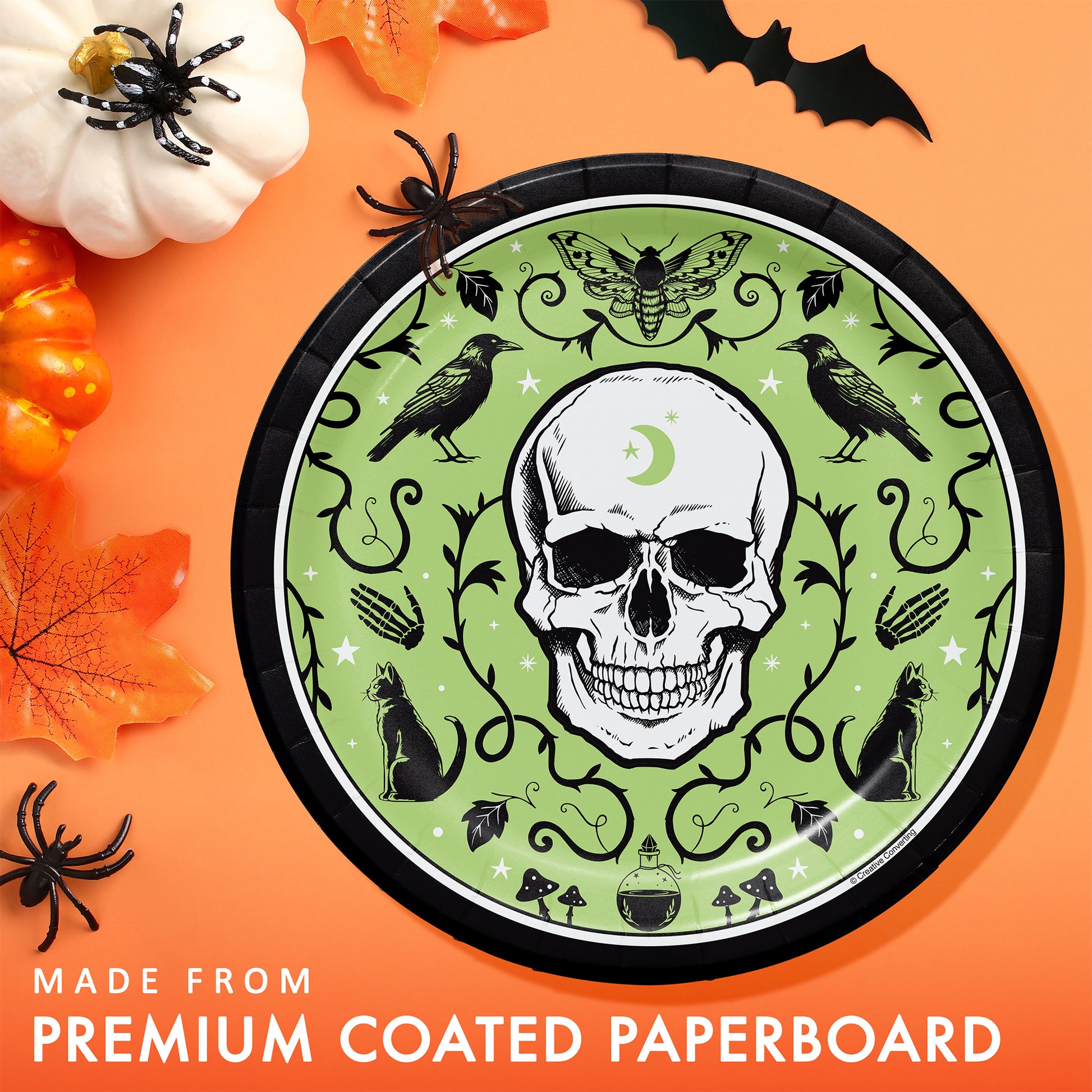 Spooky Season Dinner Paper Plates 96 ct. Halloween-themed paper plate with skull design on a colorful background