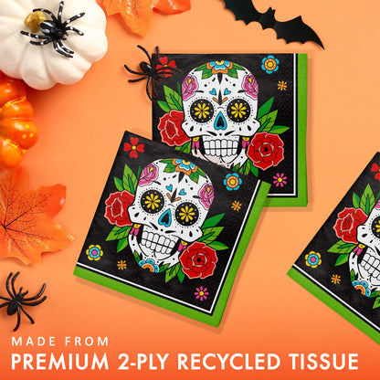 Skelebration Beverage Napkins 192 ct. Halloween-themed napkins with sugar skull design on an orange background.