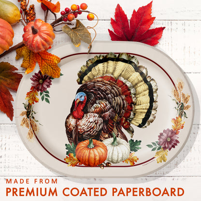 Vintage Turkey Oval Dinner Paper Plates 96 ct. Decorative plate with a turkey design, surrounded by autumn leaves and pumpkins on a white background.