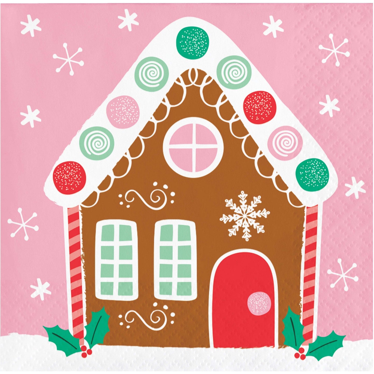 Paper napkin featuring a gingerbread house with a pink background and snowflakes.