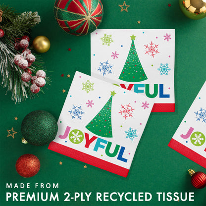 Joyful and Jolly Beverage Napkins 192 ct. Two Christmas-themed paper napkins with 'JOYFUL' text and decorations on a green background with festive ornaments.