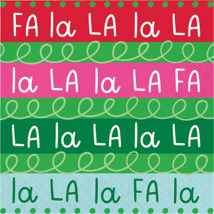 Holiday Frills Luncheon Napkins 192 ct. Colorful pattern with text 'FA la LA la LA' and decorative elements on a red, green, pink, and blue background.