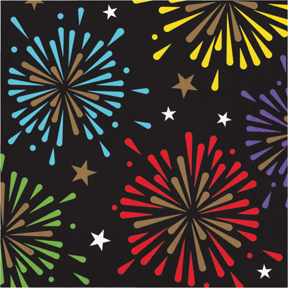 Colorful paper napkins with fireworks and stars pattern on a black background
