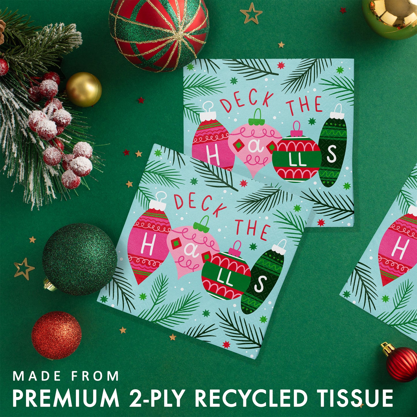 Holiday Frills Deck the Halls Beverage Napkins 192 ct. Christmas-themed paper napkins with ornaments on a green background with festive decorations.