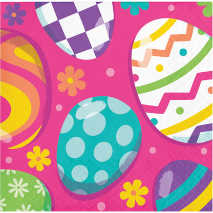 Paper napkin with colorful egg designs on a pink background
