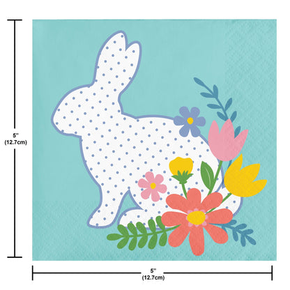 Napkin with a bunny and flowers design on a blue background, with dimensions indicated.
