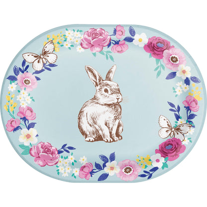 Oval plate with a rabbit illustration and floral design on a light blue background
