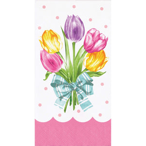 Paper napkin featuring a bouquet of colorful tulips with a bow on a polka dot background