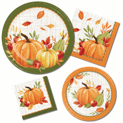 A coordinated fall harvest party tableware set including paper plates and paper napkins, all printed with orange pumpkins, apples, gourds, and leaves.