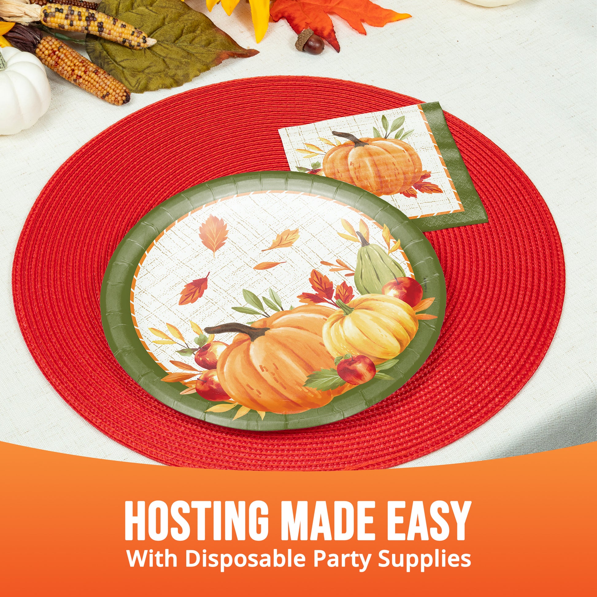 Autumn-themed disposable party tableware with pumpkin plates and matching fall napkins.