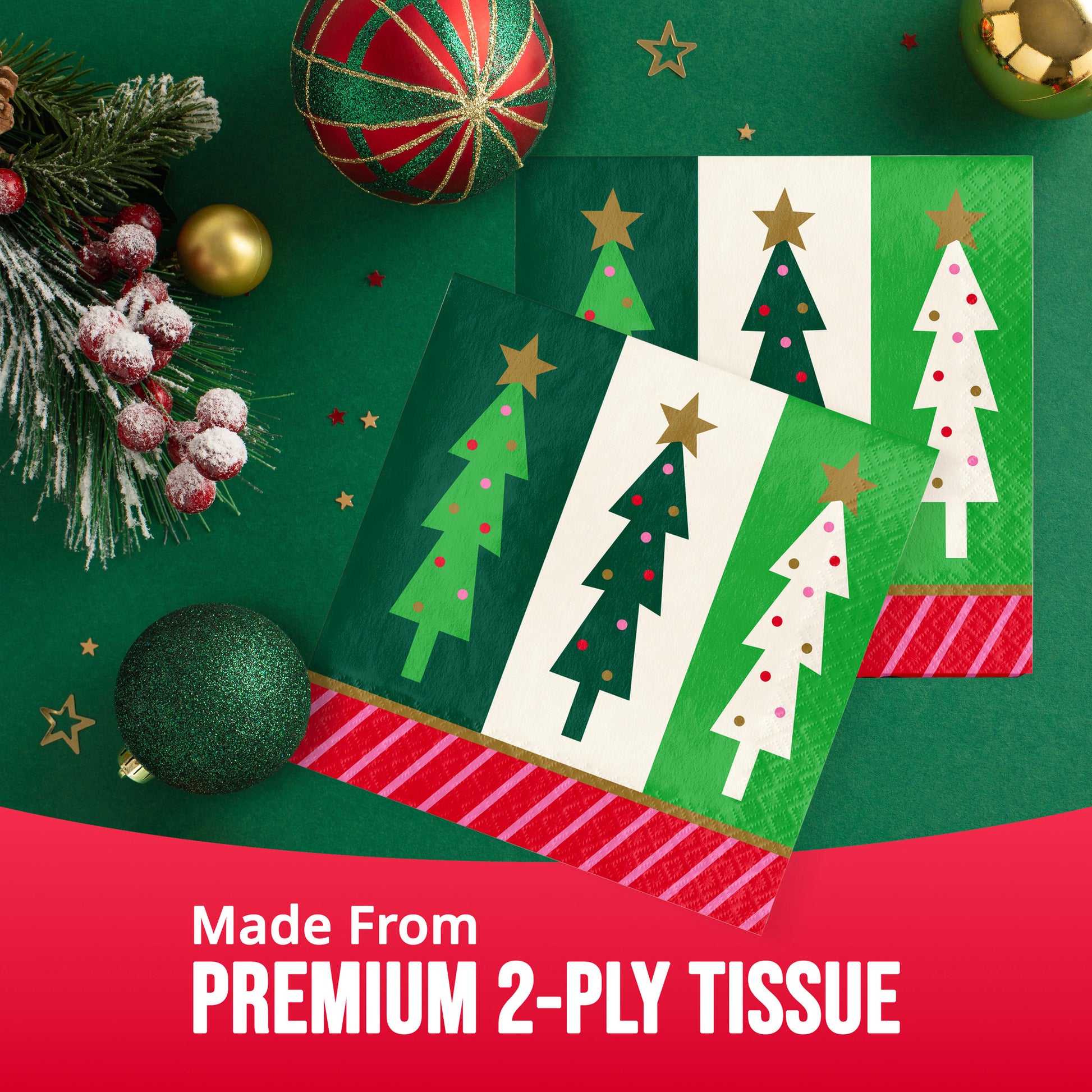 Three Christmas-themed tissue napkins with three Christmas tree designs, arranged on a dark green background with holiday ornaments and a red banner at the bottom that reads 'Made From PREMIUM 2-PLY TISSUE'.