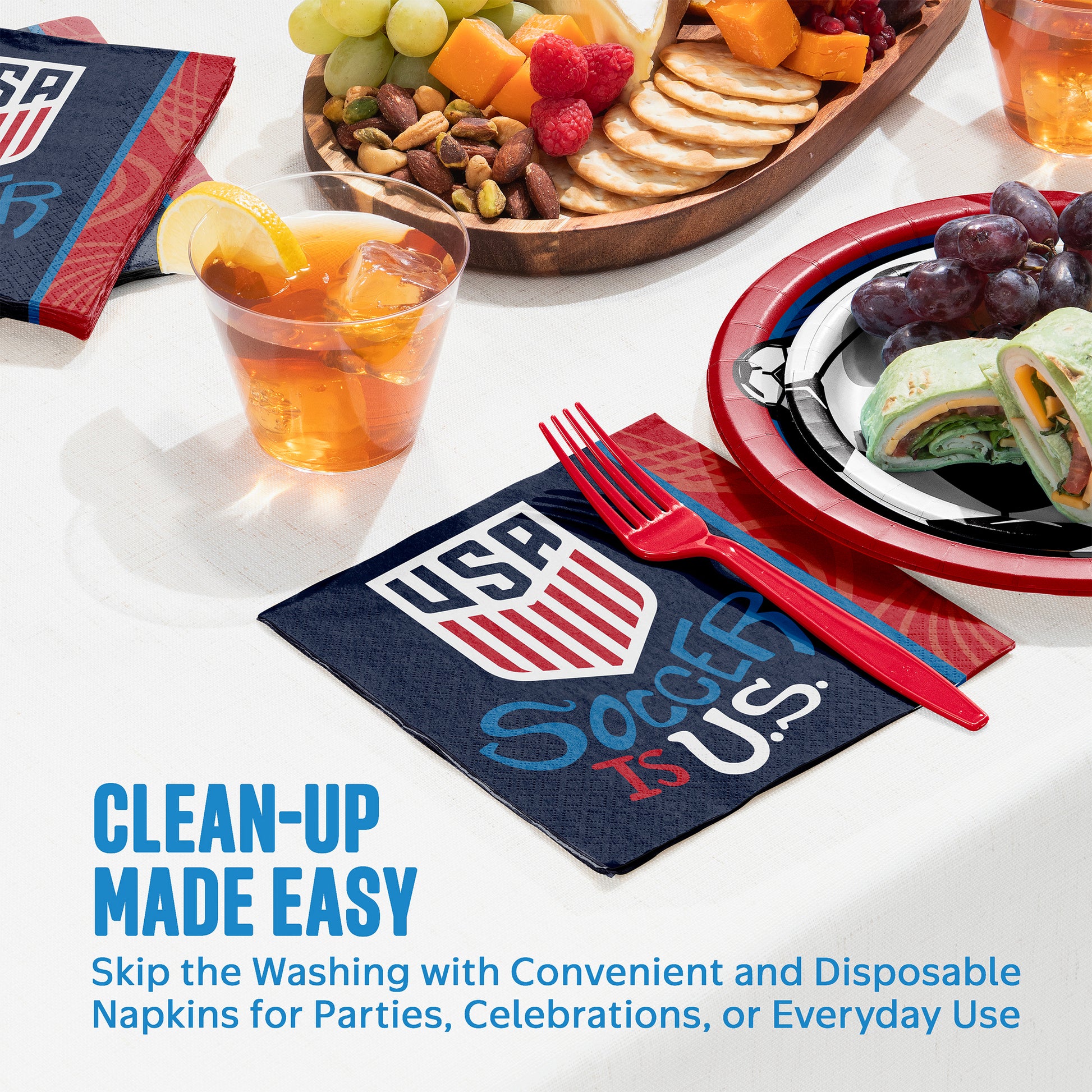 Disposable napkins with USA logo and text on a table with food and drinks.