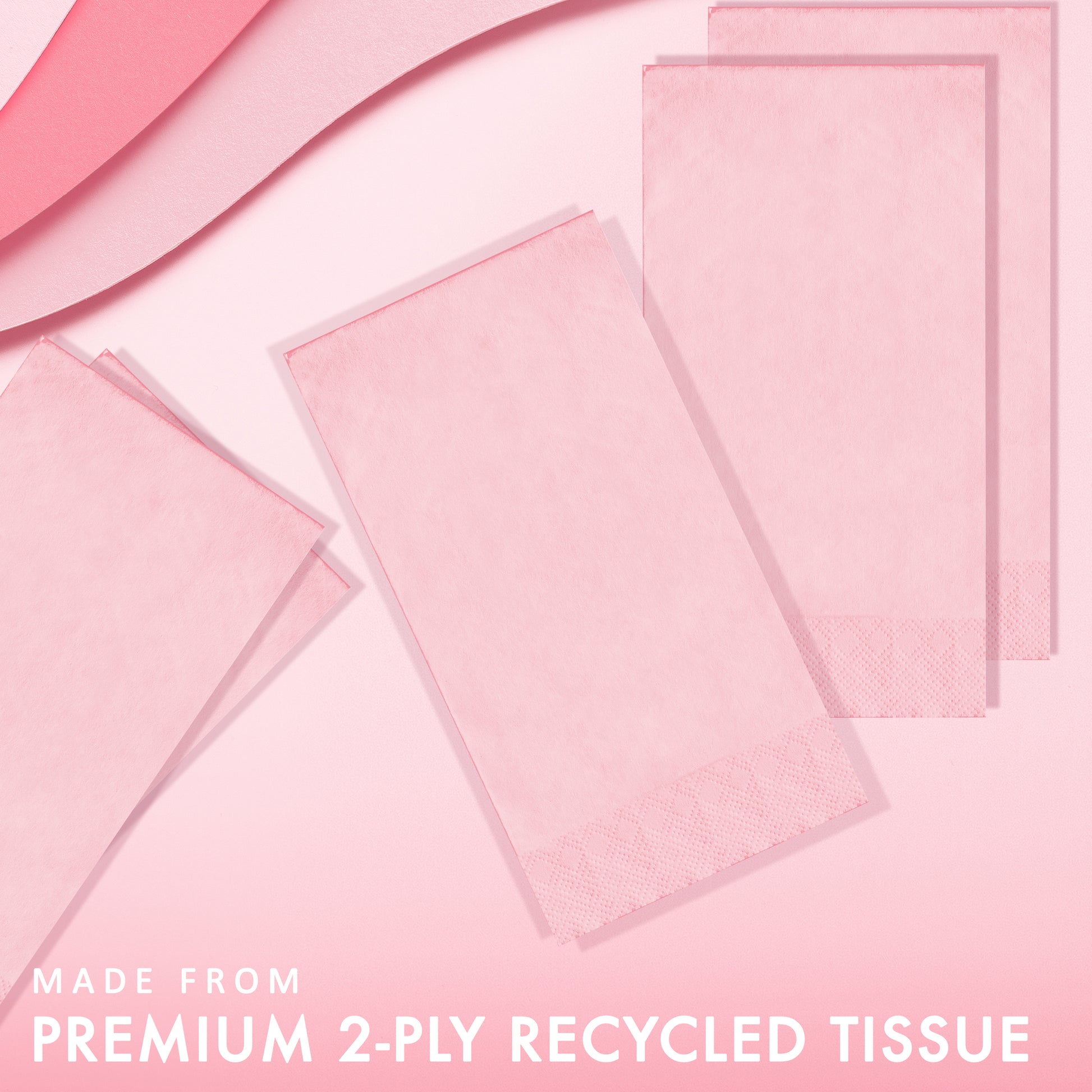 Pink napkins on a pink background with "Made from premium 2-ply recycled tissue"