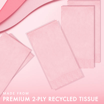 Pink napkins on a pink background with "Made from premium 2-ply recycled tissue"