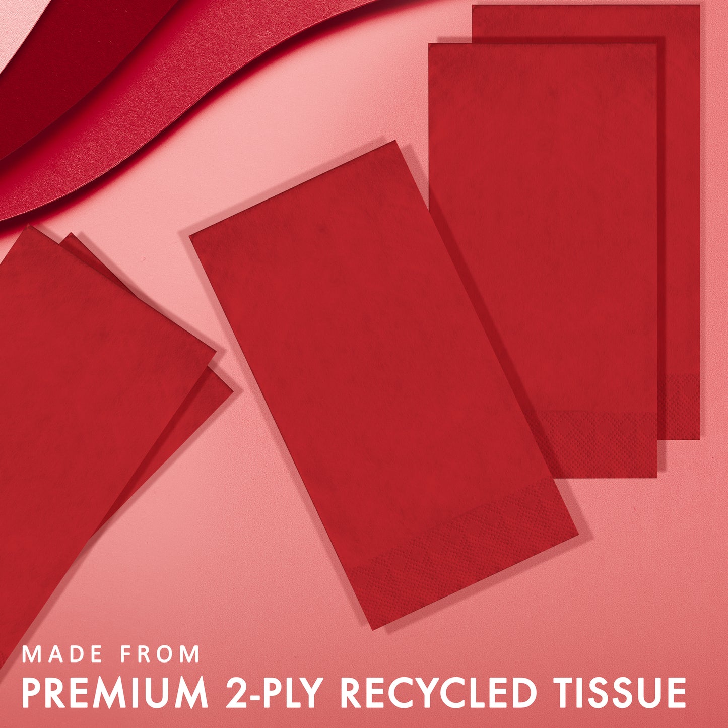 Red pin embossed guest napkins on a red background with "Made from premium 2-ply recycled tissue"