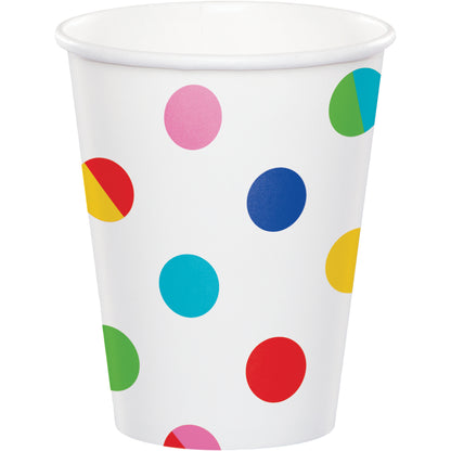 White paper cup with colorful polka dots on a white background