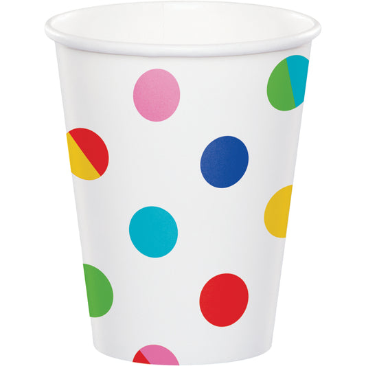 White paper cup with colorful polka dots on a white background