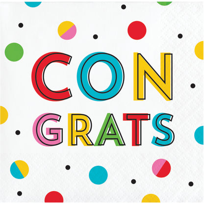 Napkin with colorful 'CONGRATS' text on a polka dot background