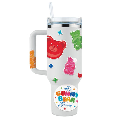 White tumbler with colorful gummy bear vinyl stickers and 'It's Gummy Bear Time!' text on a white background