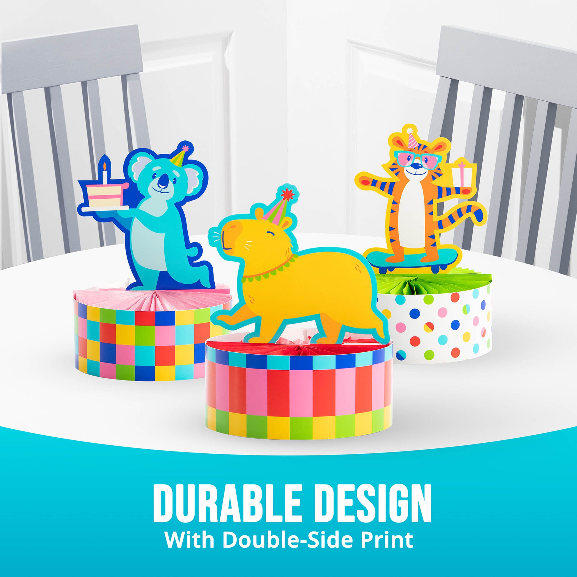 Three colorful animal-themed centerpieces on a table with chairs in the background, labeled 'Durable Design with Double-Side Print'.