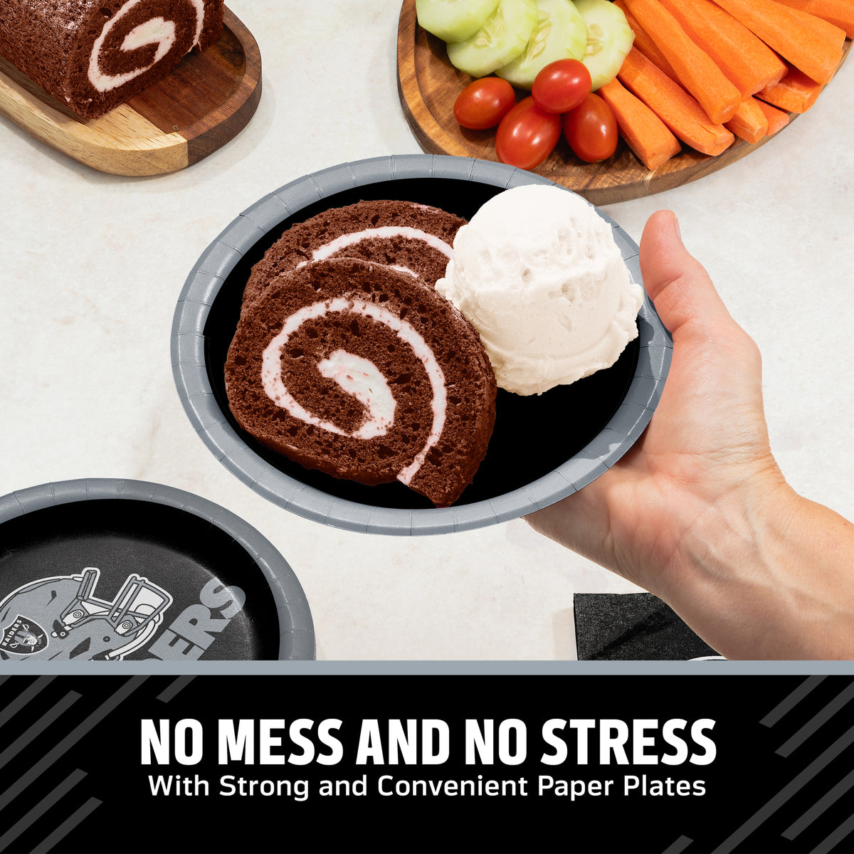 Hand holding a Las Vegas Raiders plate filled with chocolate cake and ice cream. Banner with "Clean-Up Made Easy" text along the bottom