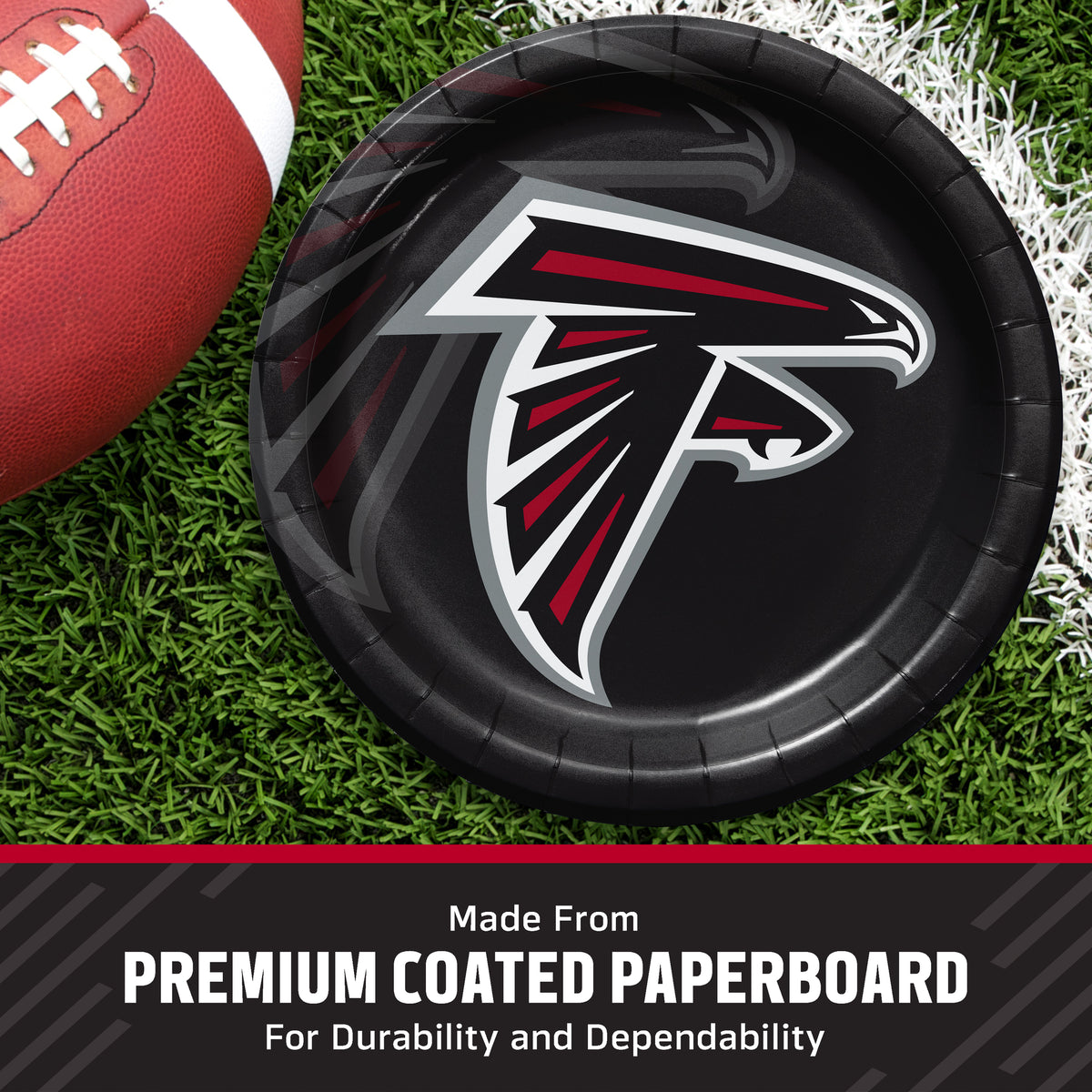 A round black paper plate featuring the Atlanta Falcons logo, styled on green turf with a football partially visible at the left edge. A dark banner at the bottom reads 'Made From PREMIUM COATED PAPERBOARD For Durability and Dependability'.
