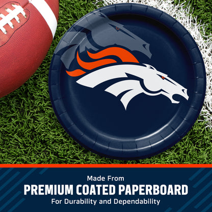 Denver Broncos themed paper plate on a green turf background next to a football, with a text banner at the bottom reading 'Made from PREMIUM COATED PAPERBOARD'.