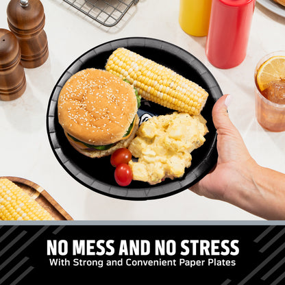 Hand holding a Las Vegas Raiders plate filled with a hamburger, corn on the cob, and potato salad. Banner with "No Mess and No Stress" text along the bottom