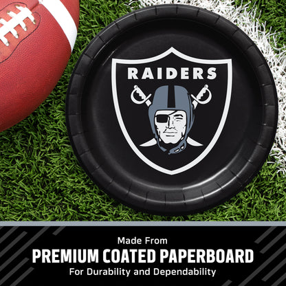 Las Vegas Raiders themed paper plate on a green turf background next to a football, with a text banner at the bottom reading 'Made from PREMIUM COATED PAPERBOARD'.