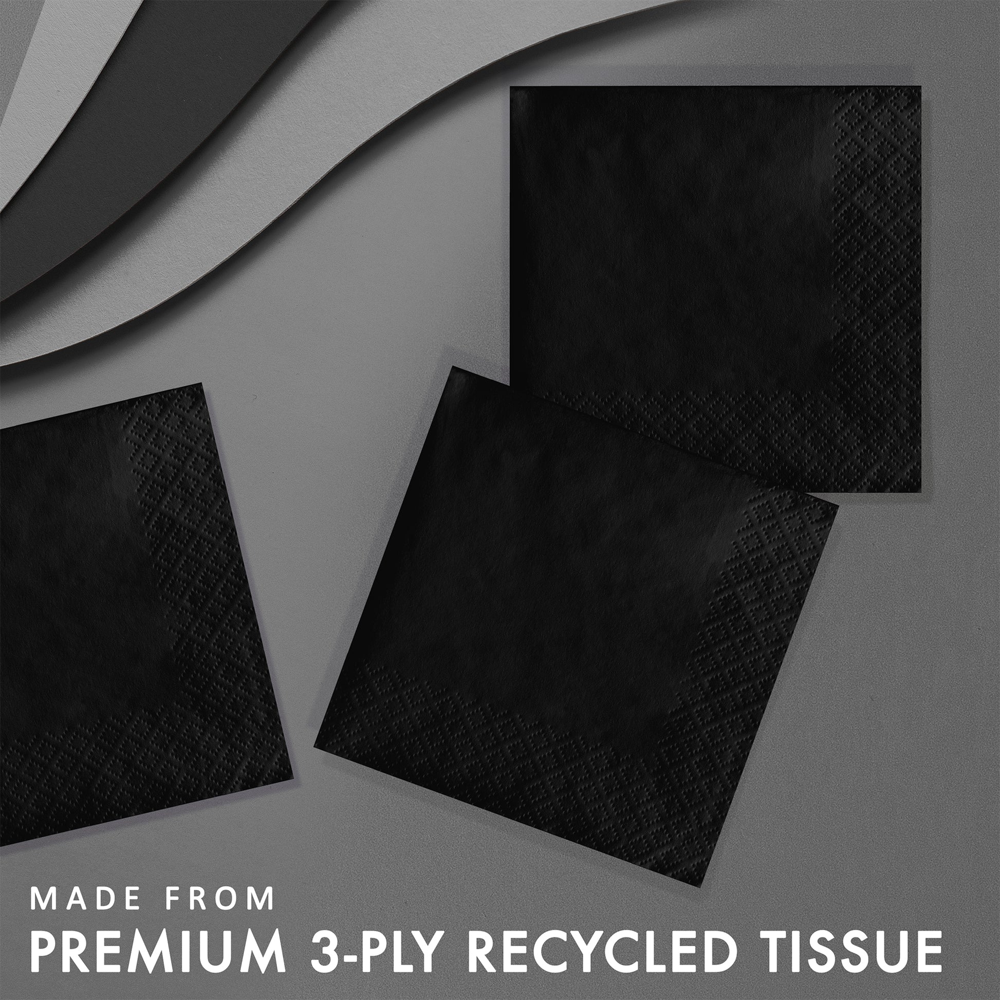 Black tissue napkins with textured surface on a gray background, labeled as premium 3-ply recycled tissue.