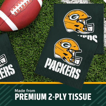 Three Green Bay Packers themed square napkins on a green turf background next to a football, with a text banner at the bottom reading 'Made from PREMIUM 2-PLY TISSUE'.