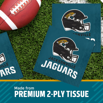 Three Jacksonville Jaguars themed square napkins on a green turf background next to a football, with a text banner at the bottom reading 'Made from PREMIUM 2-PLY TISSUE'.