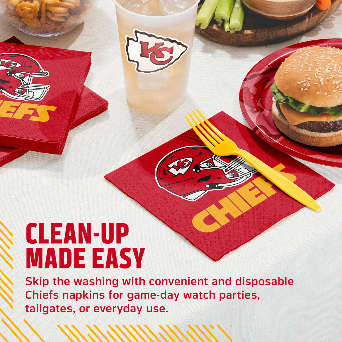Red Kansas City Chiefs branded paper napkins with a football helmet logo and yellow 'CHIEFS' text, shown on a tabletop with a yellow plastic fork, a burger on a red plate, a drink cup, and promotional text.