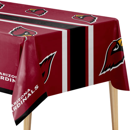 A red Arizona Cardinals themed tablecloth draped over a table, featuring the team logo, team name, and vertical black and white stripes.