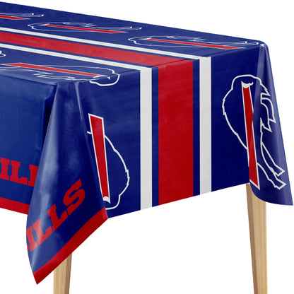 Close-up of red and blue Buffalo Bills tablecloth on a wooden table