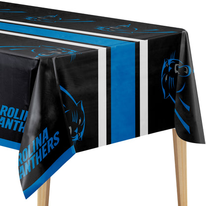 Close-up of Carolina Panthers tablecloth with blue and white stripes, panther logo, and "Carolina Panthers" text